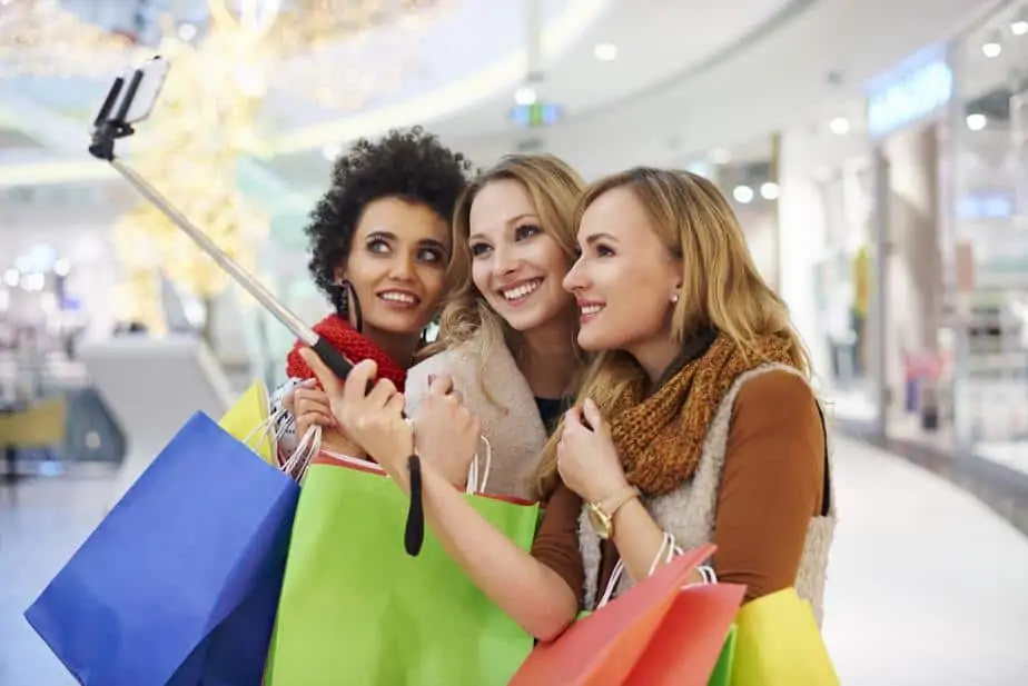 Selfie with selfie stick at the shopping mall